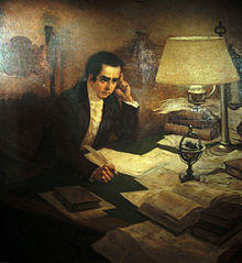 Mariano Moreno en su mesa de trabajo.jpg