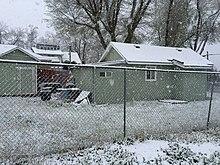 2015-05-07 06 05 45 A late spring heavy wet snowfall on back yards adjacent to 730 South 9th Street in Elko, Nevada.jpg