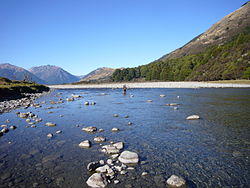 Cyclist crossing the Hurunui River.JPG