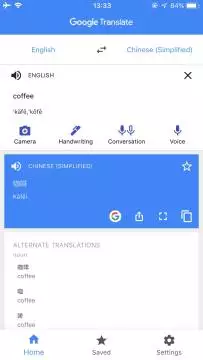 A screenshot of the iOS app of Google Translate, showing an English translation of "Coffee" to Simplified Chinese "咖啡" or "Kāfēi"
