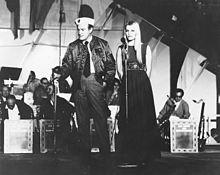 Bob Hope with Eva Rueber-Staier during USO tour on USS Saratoga (CVA-60) 1969.jpg