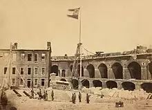Flagpole in a ruined building