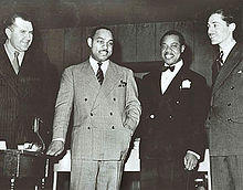 Robert Goffin, Benny Carter, Louis Armstrong, and Leonard Feather (L to R) in 1942