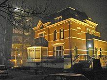Office building illuminated by high-pressure sodium lamps.