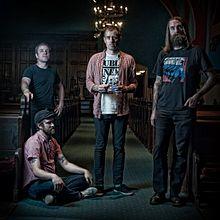 Ted Leo and the Pharmacists in a publicity photo by Kyle Cassidy.