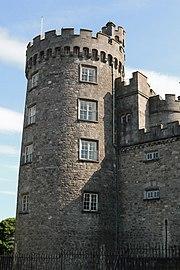 A big round castellated corner tower of a castle