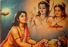 Alone, Bharat worships the sandals.jpg