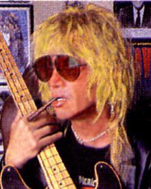 Danny Sheridan with his 1951 Fender Precision Bass in a photograph that appeared in Bass Player Magazine,[1] October 2001. (Photo by Carol Sheridan. Used with permission)