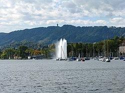 Enge harbour, Zürichsee (Lake Zürich) fountain and Felsenegg-Girstel tower as seen from Lake Zürich.