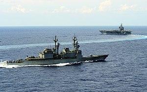 USS Thorn (DD-988) escorts USS Enterprise (CVN-65)