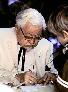 Colonel Harland Sanders in character.jpg