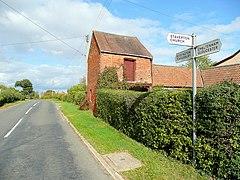 Finger post at the centre of Staverton (geograph 2636436).jpg