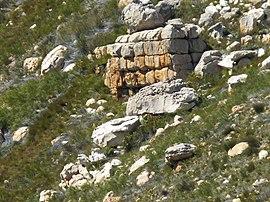 Stack of split sandstone below Cedarberg sandstone cliff.jpg