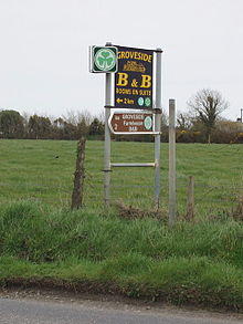 Shamrock symbol shows approved accommodation, near Kilmore - geograph.org.uk - 1301744.jpg