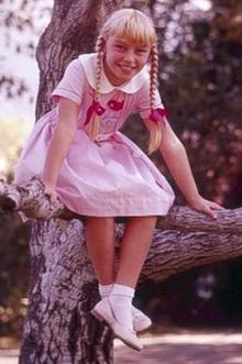 Patty McCormack as Rhoda Penmark in The Bad Seed (1956).png