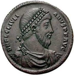 Grey coin depicting bearded man with diadem, facing right. The text around the edges reads D N FL CL IVLIANVS P F AVG, clockwise.