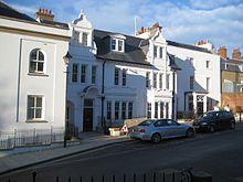 A large white terraced building