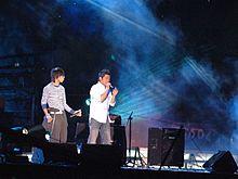 Yu Quan performing on the stage.jpg