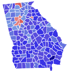 A map of Georgia counties, almost all of which are medium to dark blue with a small handful of red counties in the north