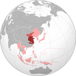 The Republic of China (dark red) and Menchiang (light red) within the Empire of Japan (pink) at its furthest extent