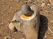 Mitmita being made in mortar and pestle.jpg