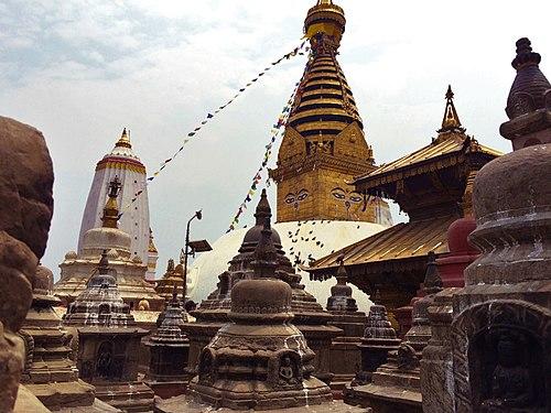 Swayambhunath stupa along with smalles stupas and pagodas in the foreground