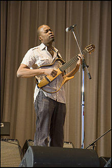 Loueke playing a skeleton guitar