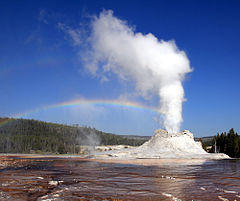 Steam Phase eruption of Castle geyser with double rainbow.jpg