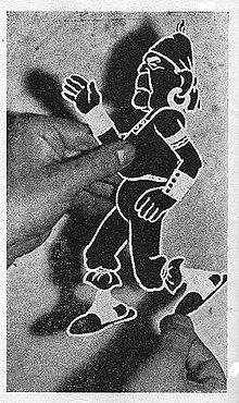 Quirino Cristiani con una figura.jpg