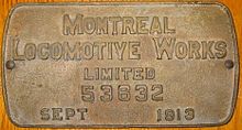 A brass boilerplate mounted on a wooden surface, and inscribed "Montreal Locomotive Works limited 53632 September 1913"