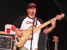 Tad Kinchla performing with Blues Traveler in East Meadow, New York (June 2013).