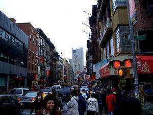 Crossing Canal Street in Chinatown, facing Mott Street toward the south