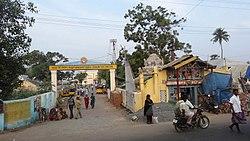 A pyramidal temple tower with sky in the background