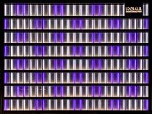 Illuminated white and purple facade of the office building Rohm Semiconductor in Kyoto, Japan.jpg