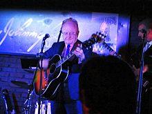 Asher performing at Johnny D's in Somerville, Massachusetts, on 8 August 2012