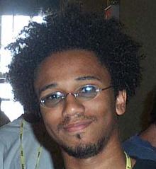 Aaron McGruder, at the 2002 Hackers on Planet Earth hacker con