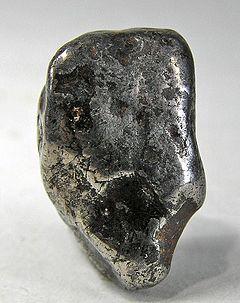 Awaruite is a nickel-iron alloy-bearing rock occuring as detritus in streams. This pebble/nugget weighs 13 grams.