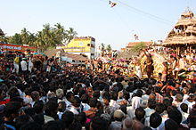Bommai offer flowers in tiruvaiyaru.JPG
