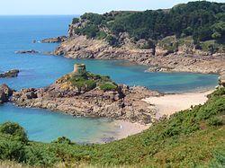 St. Brelade's coastline of promontories and bays includes Portelet and its tidal island, L'Île au Guerdain with Portelet Tower (also known as Janvrin's Tomb)