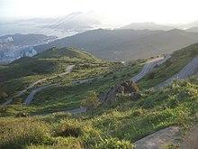 R38943437917 Upper section of Tai Mo Shan Road meandering up the mountain.JPG