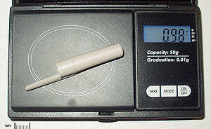 Gram (pen cap on scale).jpg