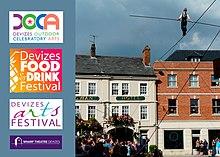 Bullzini tightrope walker over Devizes Market Place with crowd of Festival onlookers