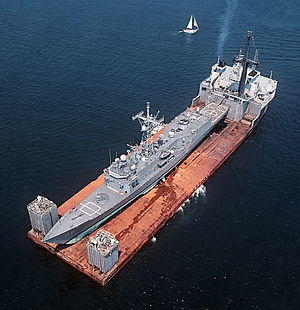 MV Mighty Servant 2 carries USS Samuel B. Roberts from Dubai to Newport, R.I., in 1988.