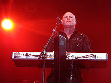 Lead singer Mike Score performing in 2011