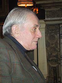 Kenneth J Lane in the living room of his apartment in the Library of the former Advertising Club.jpg