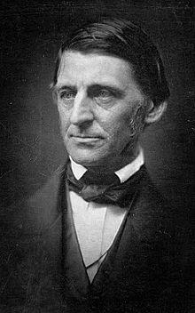 A black-and-white photograph of a middle-aged man in a suit.