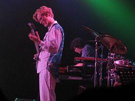 The Flower Kings performing in 2004 (Roine Stolt and Tomas Bodin pictured)