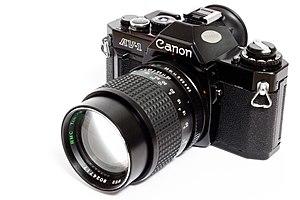 Canon av1 analog camera with 135mm lens.jpg