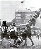 Harold Oliver of Port Adelaide taking a spectacular mark on the Adelaide Oval in 1914.