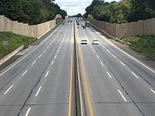 Straight, lightly-traveled section of six-lane highway